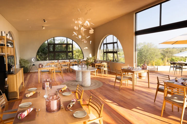 Restaurant with arched windows onto the bush