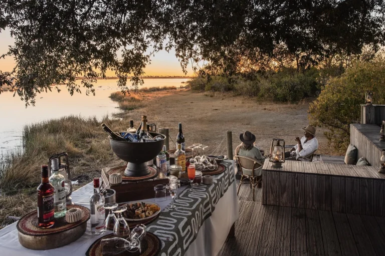 Riverside sundowners on the camp deck