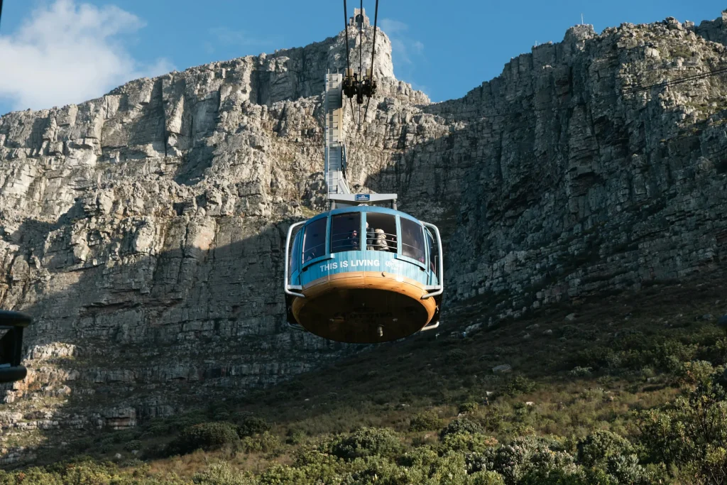 Table Mountain Aerial Cableway car climbing the cliffs above Cape Town