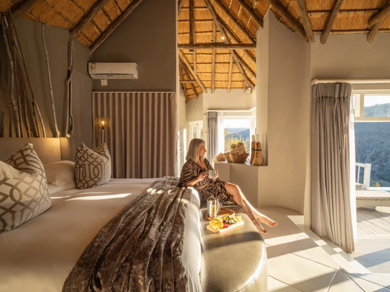 Suite bedroom opening onto the valley views
