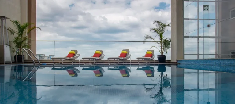 Indoor swimming pool with city views at The Concord Hotel, Nairobi