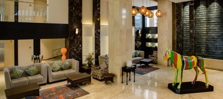 Lobby lounge with a painted horse sculpture at The Concord Hotel