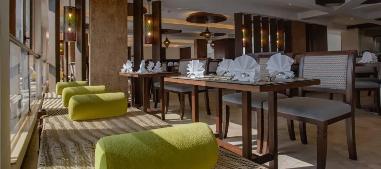 Restaurant with window seating at The Concord Hotel