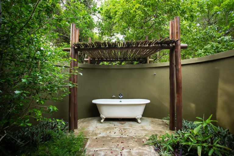 Outdoor bath in a private garden at Falaza