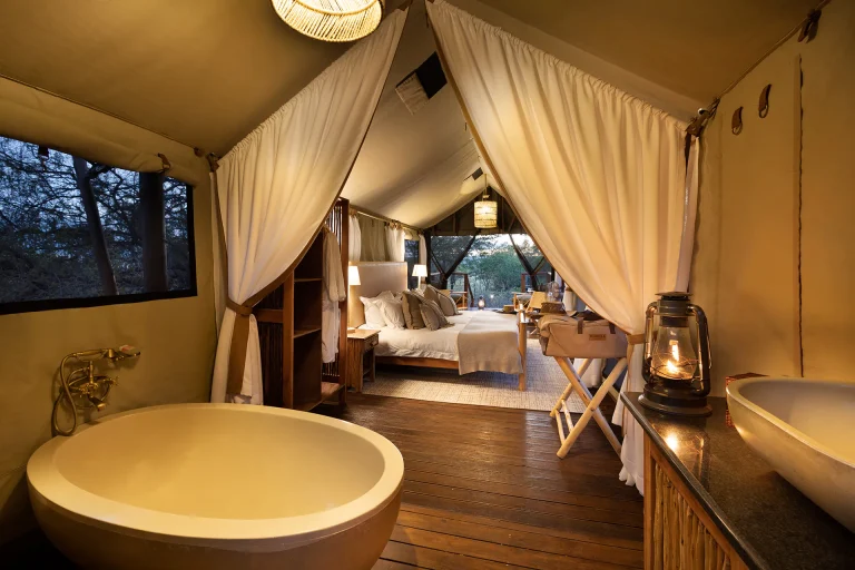 Tent with a freestanding bath and private deck