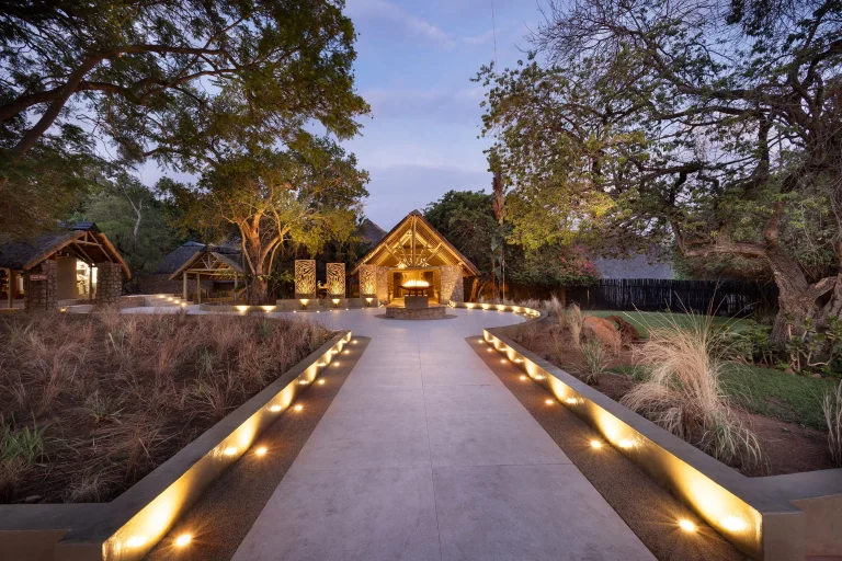 Lit pathway to Mabula Game Lodge at dusk