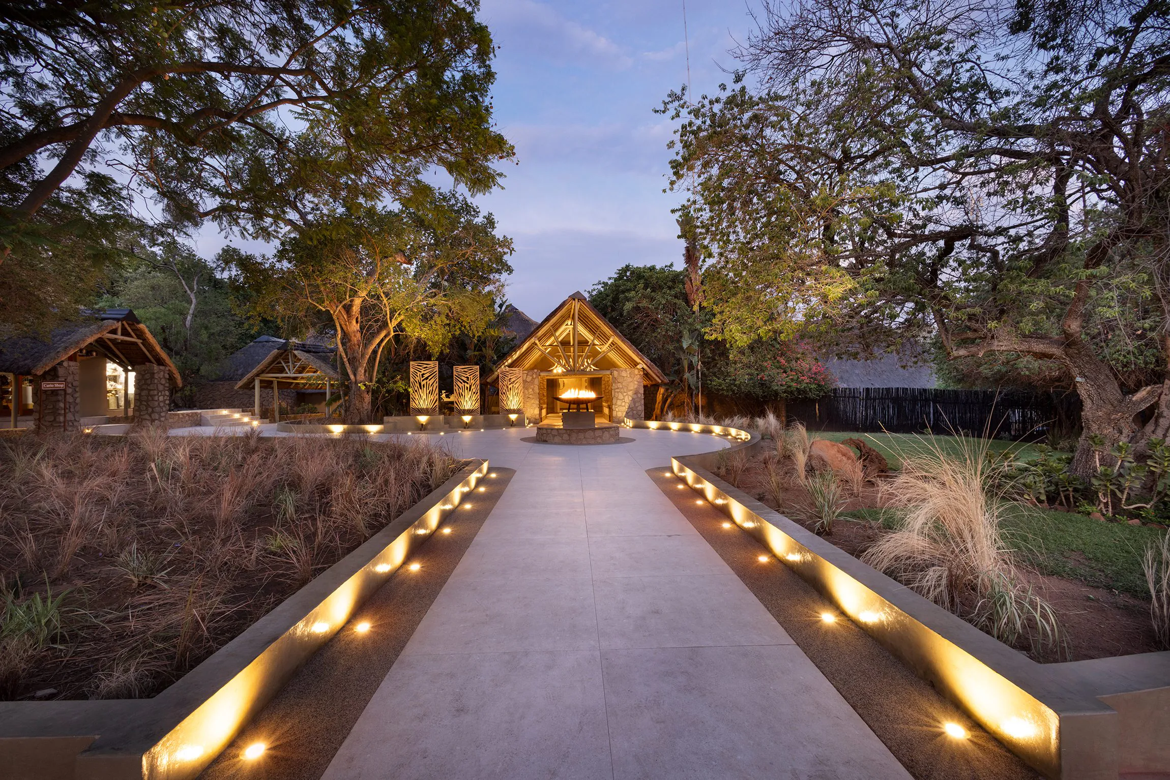 Lit pathway to Mabula Game Lodge at dusk