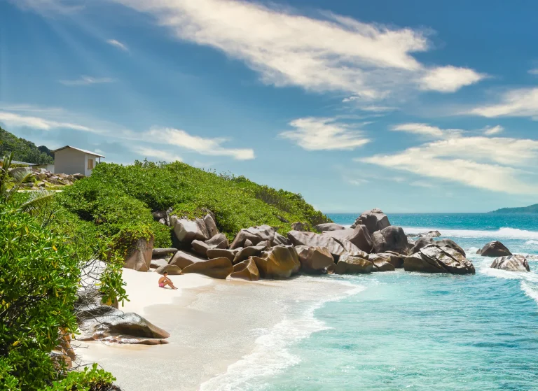 Rocky cove and clear water on La Digue