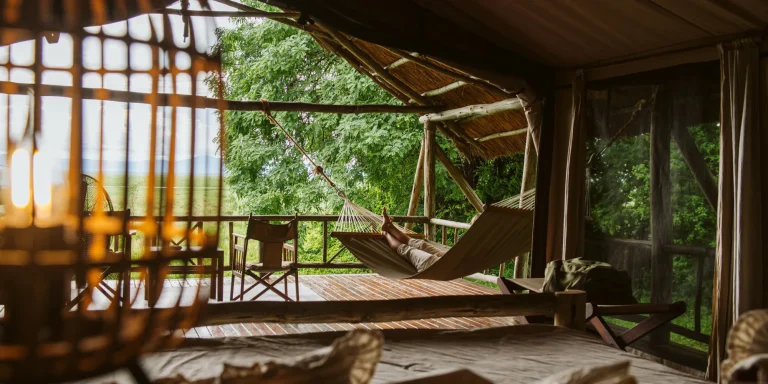 Tent interior at Katavi Wildlife Camp with a view of the plains