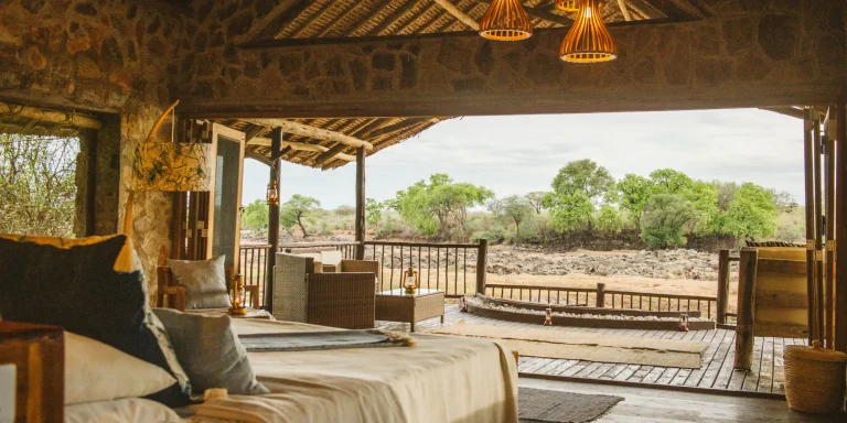 Open-fronted room at Ruaha River Lodge looking over the river