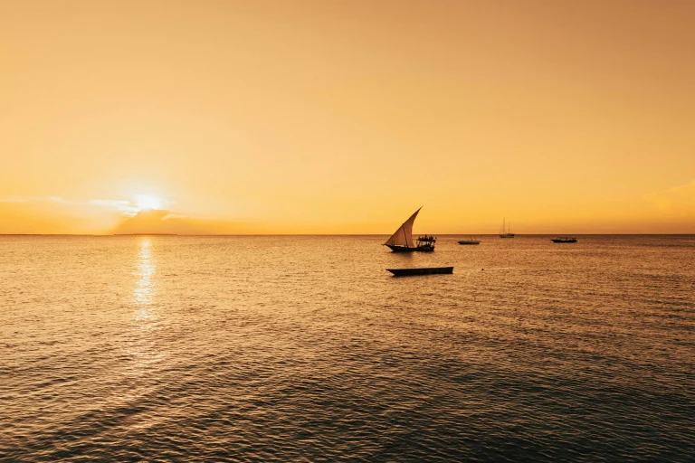 Dhows on the Indian Ocean at sunset off Zanzibar